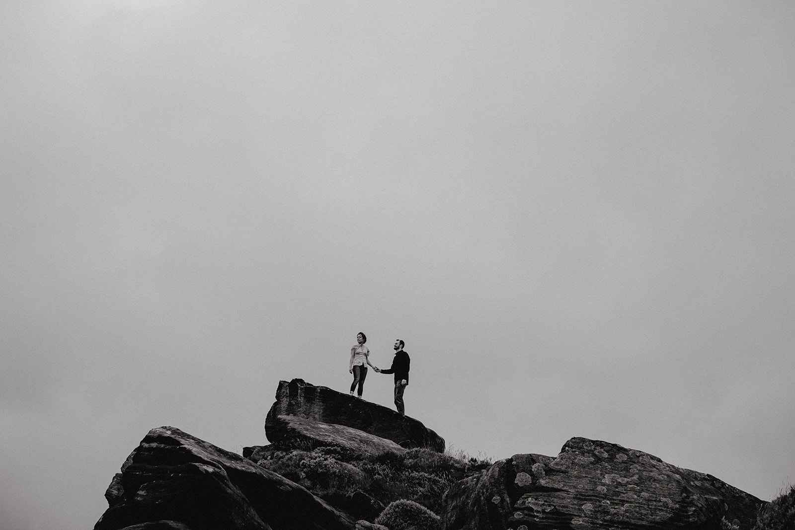 Couple at The Roaches, Peak District engagement photography - Bowl of Corks