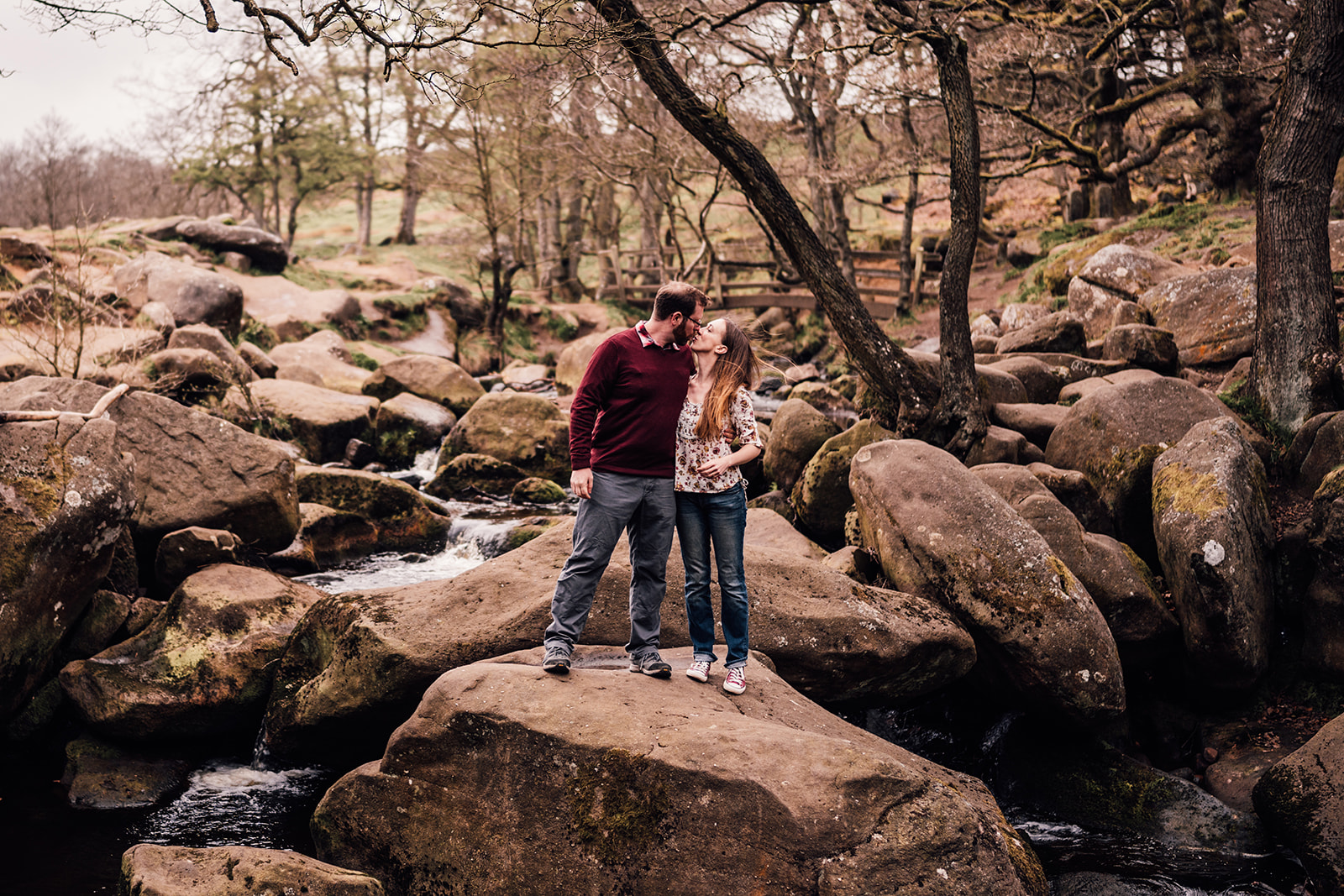 Couple in Padley Gorge woodland, Peak District engagement photography - Bowl of Corks